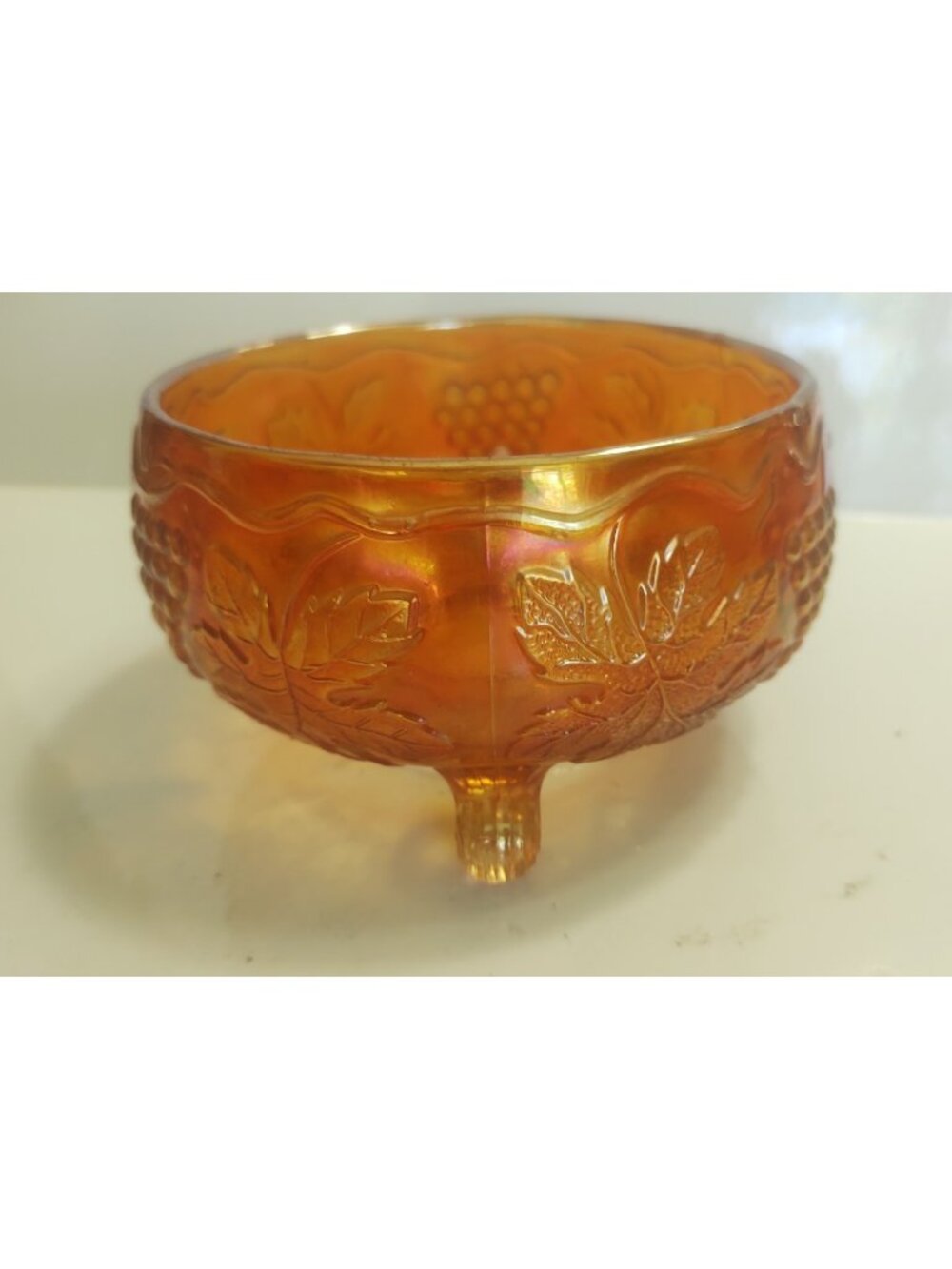 vintage Fenton Marigold Carnival Glass Grape and Cable three-footed bow,